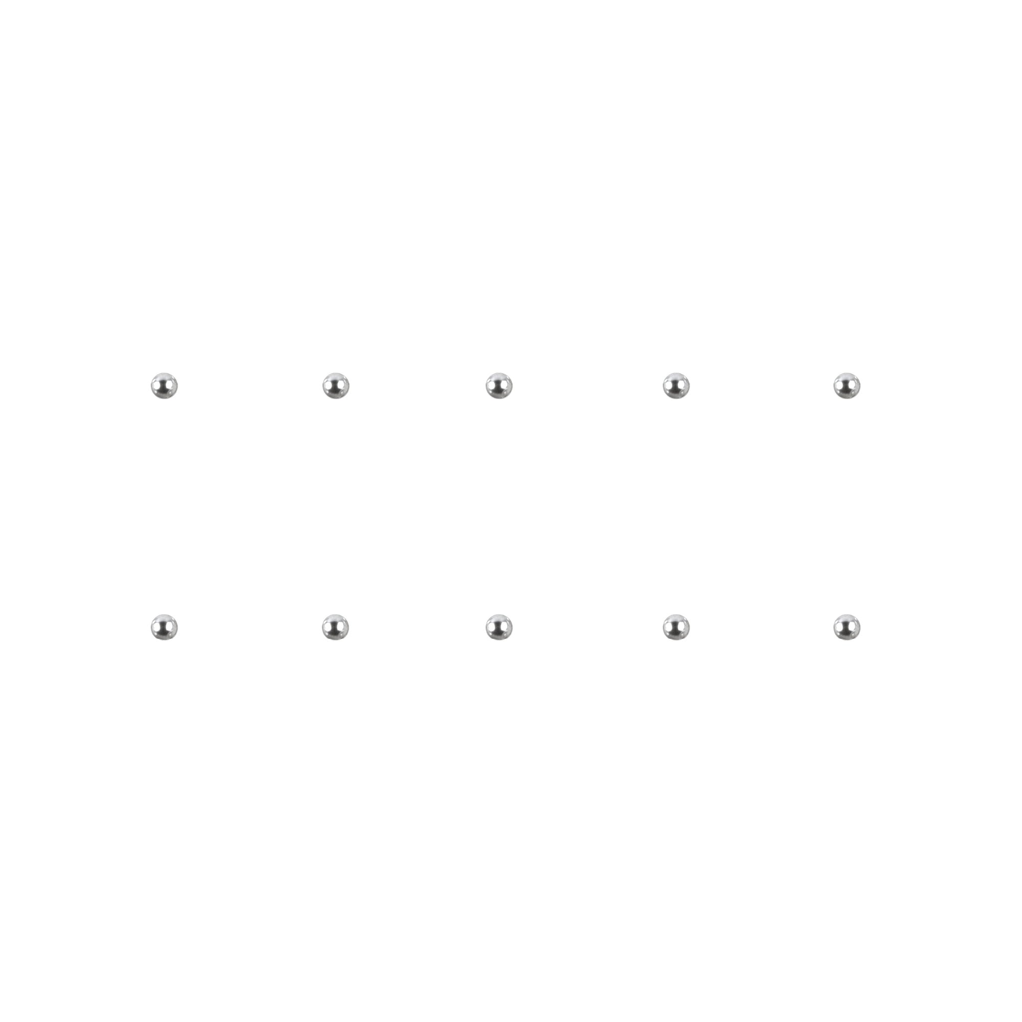 Set of silver chrome nail charms on a white background