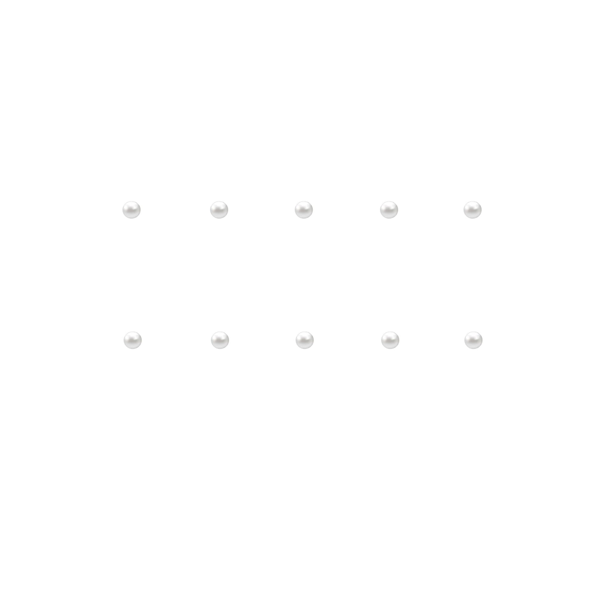 Set of small pearl nail charms on a white background