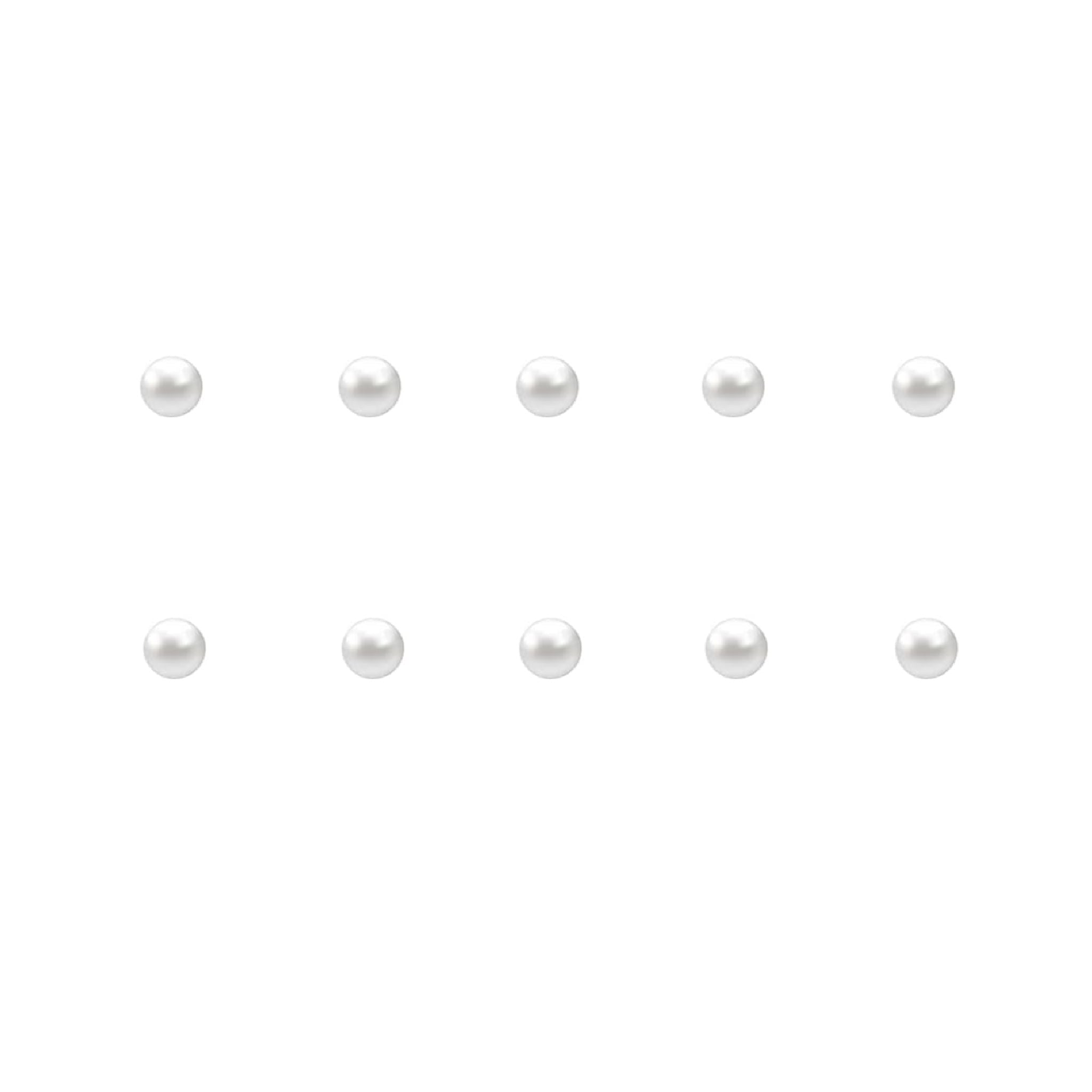 Set of small pearl nail charms on a white background